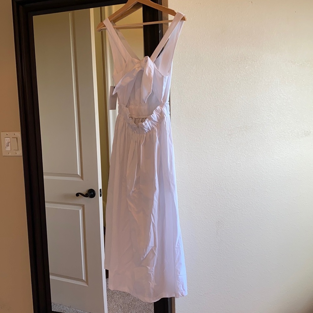 White a-line dress with upper back tie